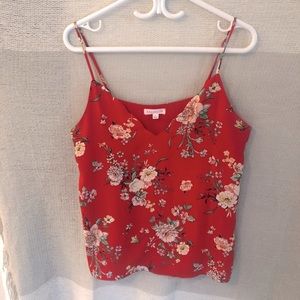 Red floral sleeveless blouse